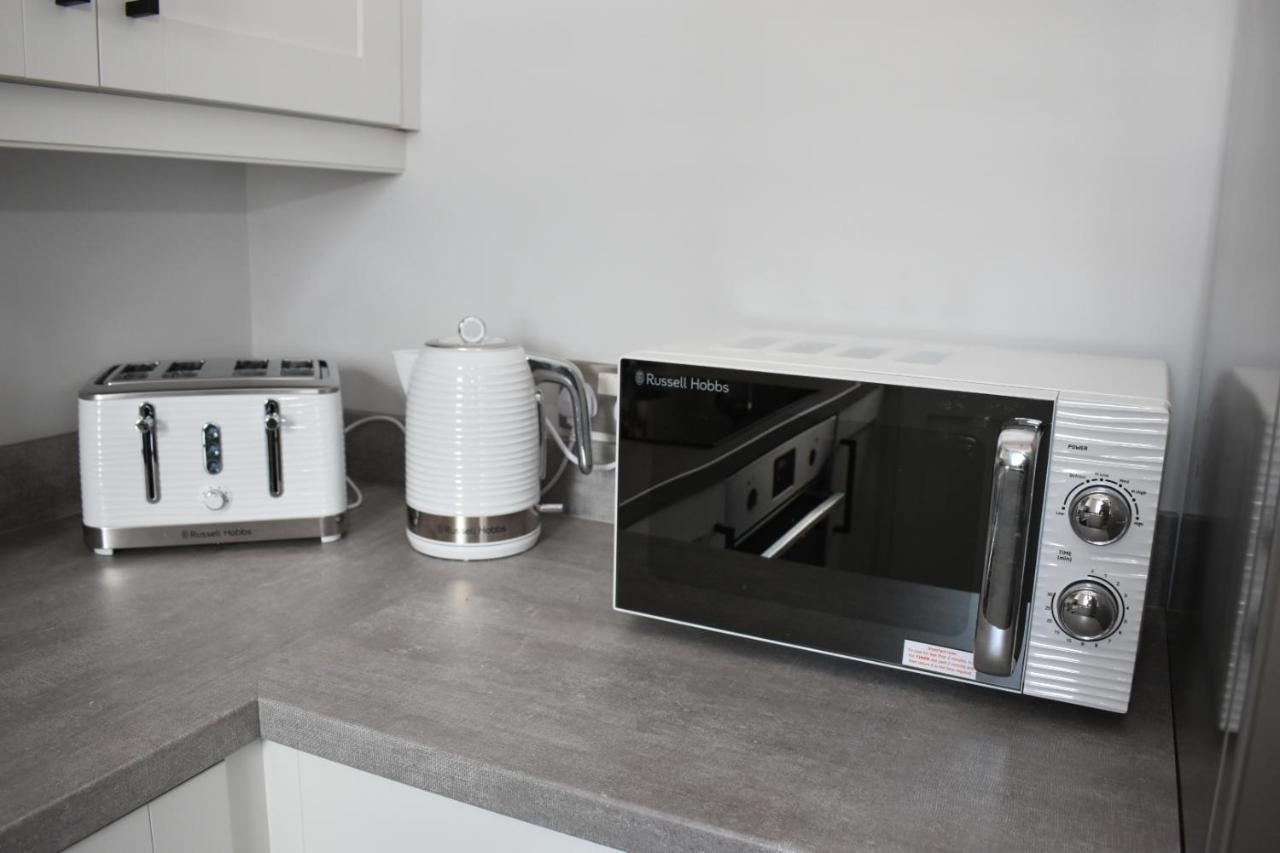 Causeway Coast Apartments Cora Marine Баликасъл Екстериор снимка